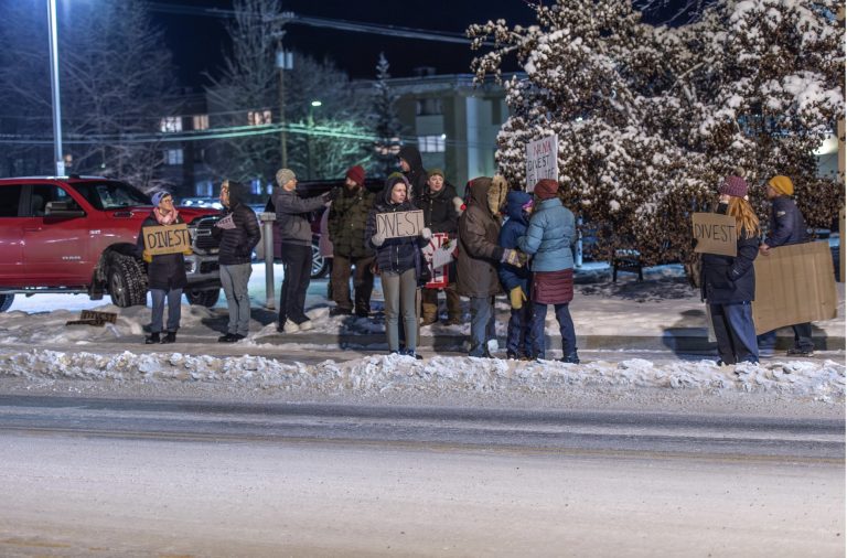 Small crowd protests NANA’s ICE contract outside Fairbanks meeting – after years of silence