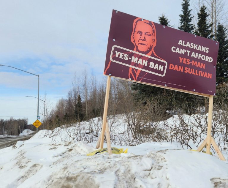 Sign attacking Sullivan goes up illegally on DOT right-of-way in Anchorage