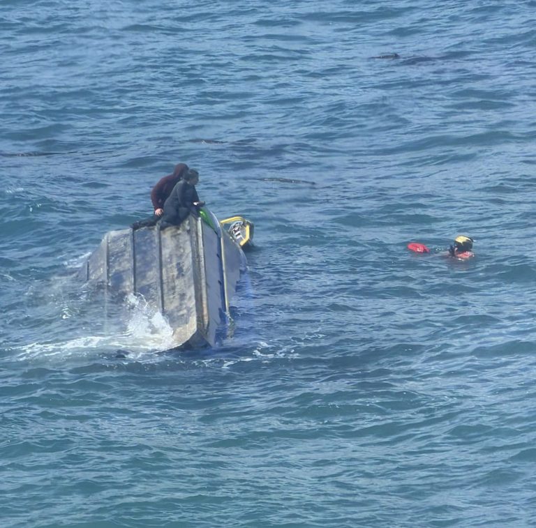 Can’t park there: Two boaters perched on sinking vessel were saved by Lady Luck and US Coast Guard